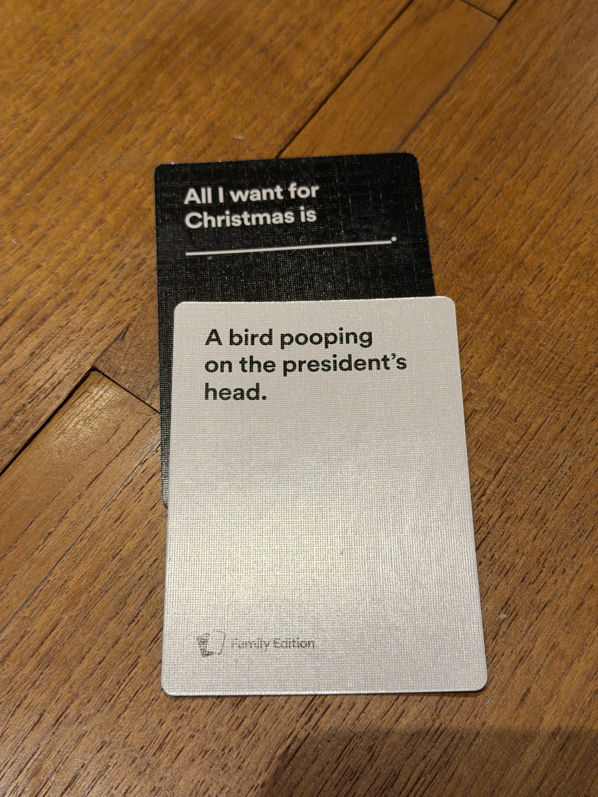 Cards Against Humanity: “All I want for Christmas is” paired with “A bird pooping on the president’s head.”